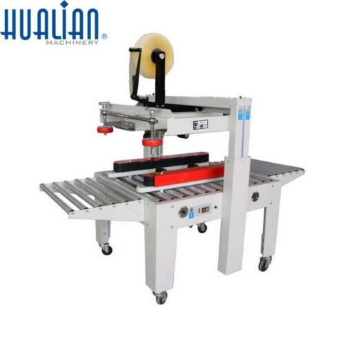 heavy-carton-sealing-machine08283405809-1.jpg Máquina cerradora de cajas de cartón pesado